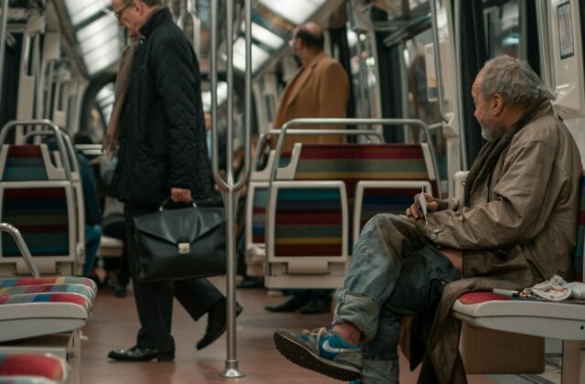 Poor man in subway