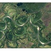 What even is a meandering river? A philosophy-enhanced synthesis of multilevel causes and systemic interactions contributing to river meandering