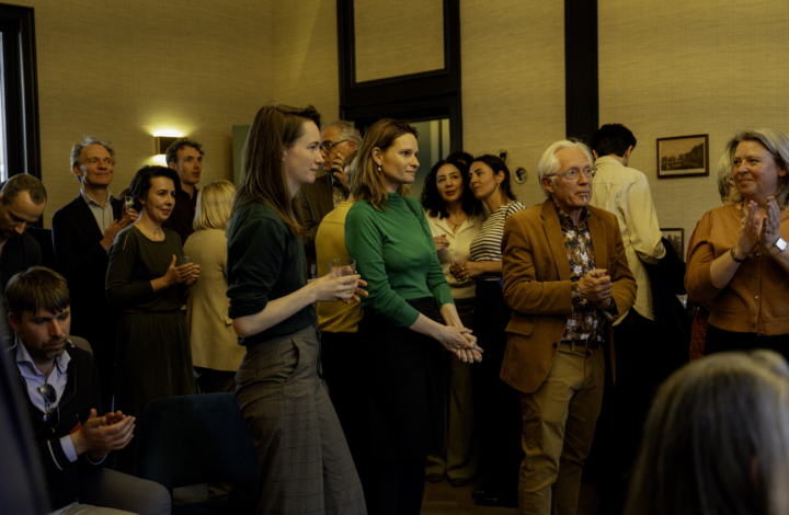 Image showing at group of fellows at an event.