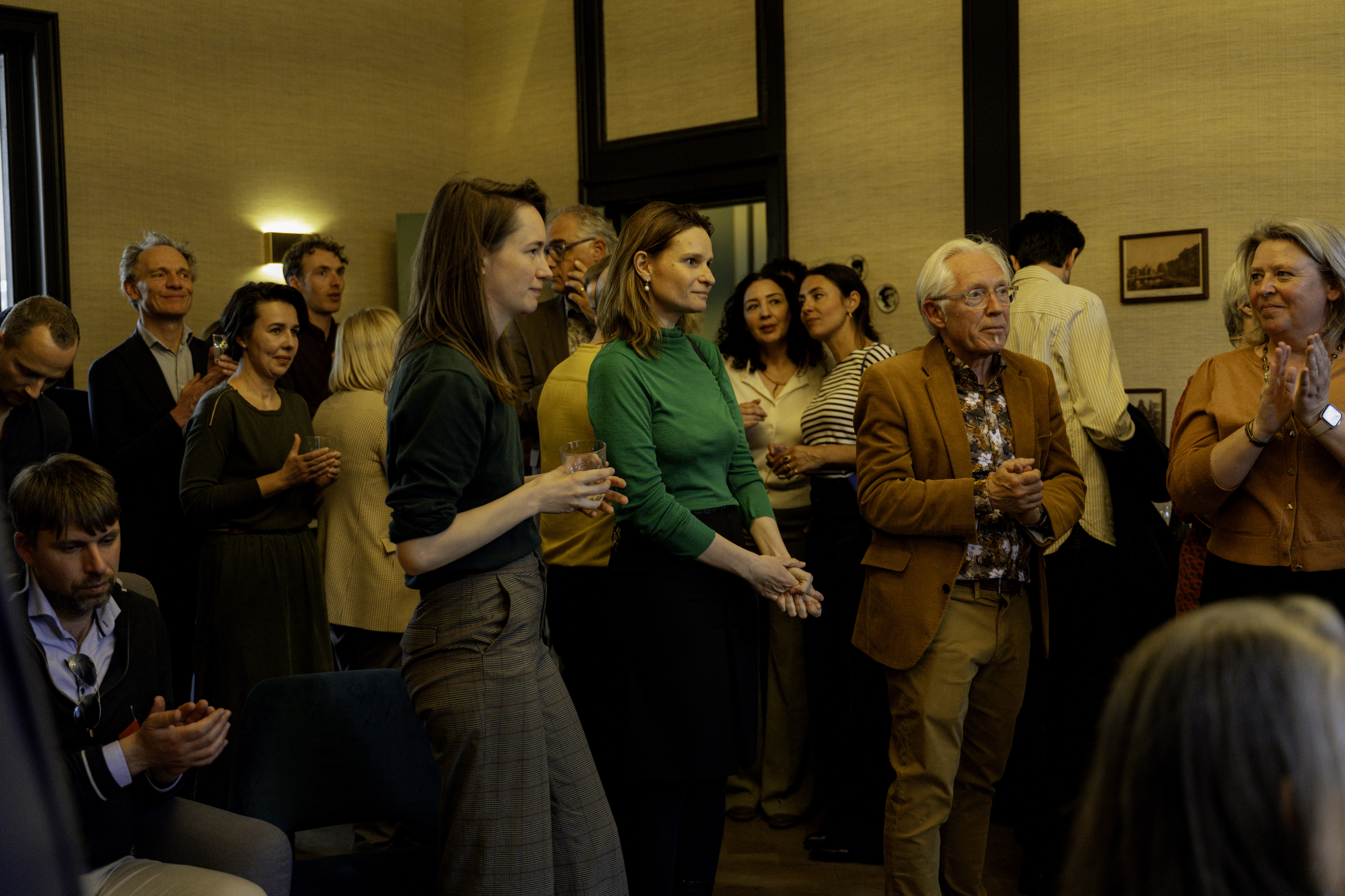 Image showing at group of fellows at an event.