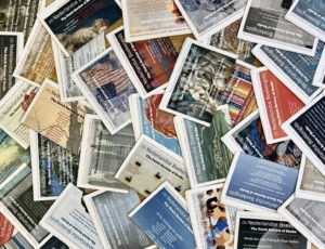 Dozens of issues of The Dutch Review of Books spread across a surface.